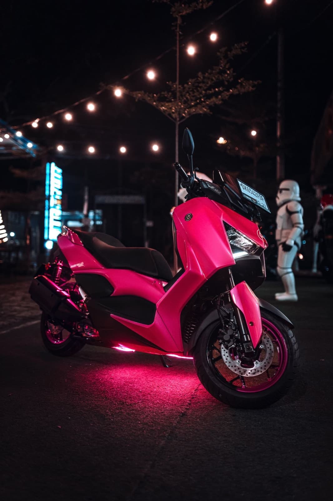 Pink Xmax with underglow, painted at GTA Garage